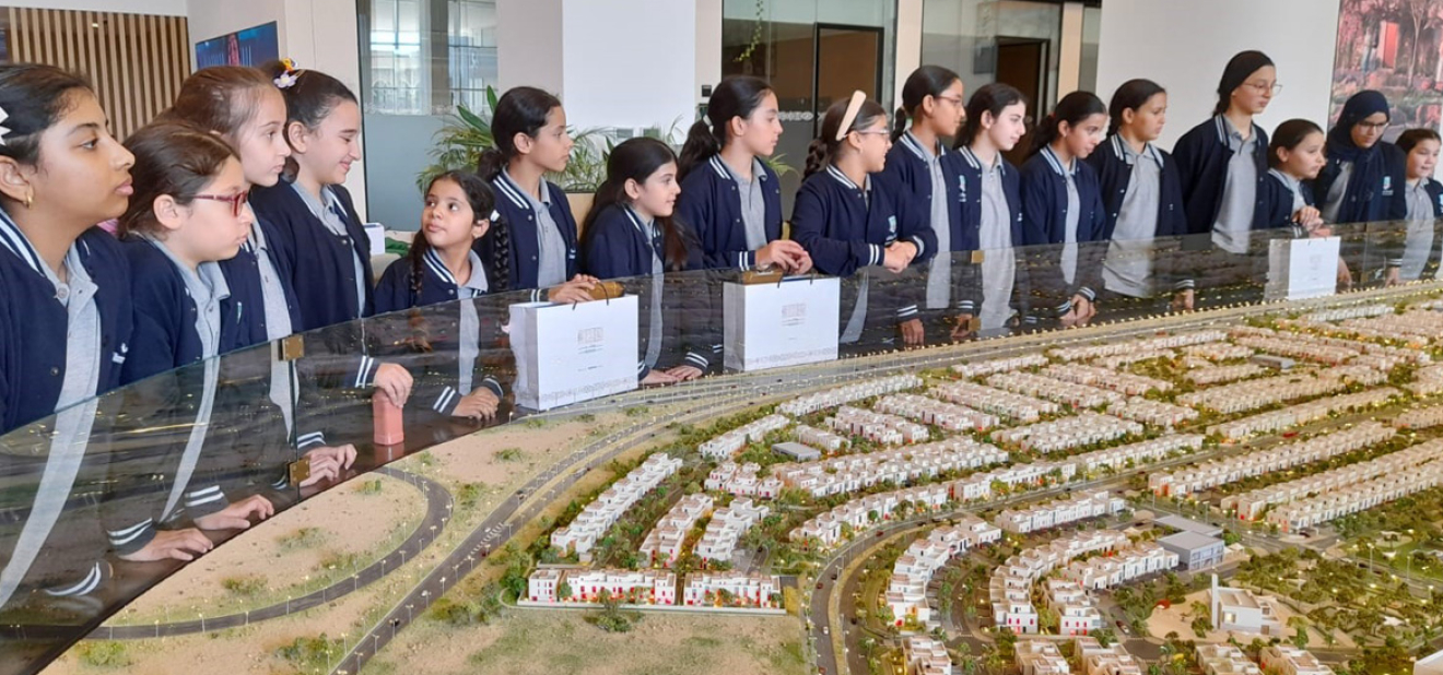 Al Hamraa International Schools students visiting Roshn Real Estate to express gratitude to employees, reinforcing values of appreciation and community service in line with Vision 2030.